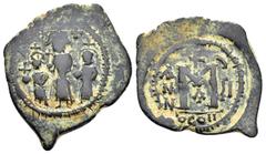Byzantine Coins HERACLIUS with MARTINA and HERACLIUS CONSTANTINE.(610-641). Follis. Obv : Martina on left, Heraclius, bearded, in centre, and Heraclius Constantine, on right, standing facing, all crow