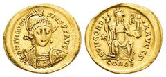 Roman Imperial Coins THEODOSIUS I (379-395).Constantinople.Solidus. Obv : D N THEODOSIVS P F AVG. Pearl-diademed, helmeted and cuirassed bust facing slightly right, holding spear and shield decorated 