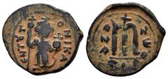 ISLAMIC COINS UMAYYAD.Time of the Rashidun.Pseudo-Byzantine.( 632-660).Fals. Obv : EN T૪TO NIKA. Imperial figure standing facing, wearing crown surmounted by cross, holding long cross in his right han