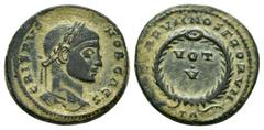 Roman Imperial Coins CRISPUS.(316-326).Arles.Follis. Obv : CRISPVS NOB CAES. Laureate and cuirassed bust of Crispus, right. Rev : AESARVM NOSTRORVM. Around VOT / V in laurel wreath; in exergue, TA. RI