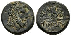 Greek Coins PAPHLAGONIA.Sinope.Struck under Mithradates VI.(Circa 95-90 or 80-70 BC).Ae. Obv : Laureate head of Zeus right. Rev : ΣΙΝΩΠΗΣ. Eagle, with head right and wings spread, standing left on thu