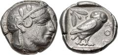 Greek ATTICA, Athens. Circa 454-404 BC. AR Tetradrachm (24mm, 17.09 g, 8h). Helmeted head of Athena right, with frontal eye / Owl standing right, head facing, closed tail feathers; olive spray and cre
