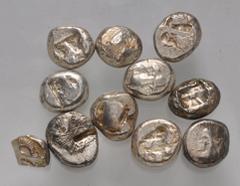 Large Lots GREEK. Asia Minor. Lot of eleven (11) AR Staters. Includes: various types from Ionia, Caria and Lycia. A very nice variety of types. Fine-VF, some toned, three with test cuts, one a hacksil