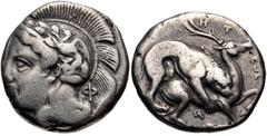 LUCANIA, Velia. Circa 440/35-400 BC. AR Nomos (19mm, 7.58 g, 7h). Head of Athena left, wearing crested Attic helmet decorated with griffin and wreath; Φ behind / Lion attacking stag right. Williams 15