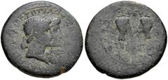 LYDIA, Magnesia ad Sipylum. Augustus, with Livia, Caius, and Lucius. 27 BC-AD 14. Æ (21mm, 5.33 g, 12h). Dionysios Kilas, son of Dionysios, priest of Augustus. Conjoined laureate head of Augustus and 