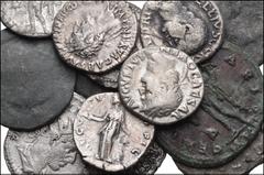 ROMAN. Imperial. Lot of Fourteen (14) AR and Æ from Augustus to Galerius. Includes: Augustus. Æ As. Countermarked (3) // Nero. AR Denarius // Vitellius. AR Denarius // Nerva. AR Denarius // Faustina J