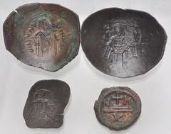 Large Lots BYZANTINE. Lot of four (4) bronze and billon issues. Includes: Maurice Tiberius. Æ Decanummium. Carthage mint // Isaac II Angelus. BI Trachy // Latin Rulers of Constantinople. BI Trachy // 