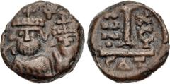 Byzantine Heraclius, with Heraclius Constantine. 610-641. Æ Decanummium (13mm, 3.14 g, 6h). Catania mint. Dated RY 16 (625/6). Crowned and draped facing busts of Heraclius and Heraclius Constantine; c