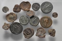 Large Lots ROMAN. Imperial. Lot of seventeen (17) silver, bronze, and lead issues. Includes: Honorius. AR Siliqua // Bronzes (6) // PB Seals (10). Average Fair to Fine, the siliquae Near VF. LOT SOLD 