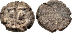 Byzantine Circa 7th century AD. Terracotta "True Cross" Pilgrim Relic Token (18mm, 1.53 g). Large Latin cross; large figure at each side of base / Blank. Mitchiner, Medieval Pilgrim & Secular Badges 1