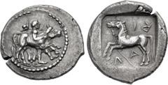 Greek THESSALY, Larissa. Circa 460-450 BC. AR Drachm (22mm, 5.85 g, 3h). The hero Thessalos, petasos hanging from neck, restraining with band he holds in both hands a bull rearing right; lotus flower 