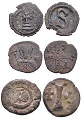 BYZANTINE. Lot of Two (2) Æ of Heraclius and Alexius I, plus One (1) Token. Includes: Heraclius. Æ 6 Nummi. Alexandria mint. Cross potent on base of two steps / Large S. SB 862 // Alexius I. Æ Tetarte