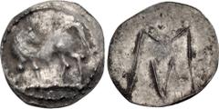 Greek LUCANIA, Sybaris. Circa 550-510 BC. AR Hemiobol(?) (9.5mm, 0.25 g, 10h). Bull standing left, head right; VM in exergue / Large M above V. Cf. S&S Class B, pl. 48, 12 (obol); cf. HN Italy 1739 (o