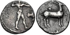 Greek BRUTTIUM, Kaulonia. Circa 400-389/8 BC. AR Third Nomos – Drachm (14.5mm, 2.20 g, 11h). Apollo advancing right, holding branch; small daimon running right on Apollo's left arm; to right, bird fly