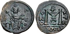 ISLAMIC, Umayyad Caliphate. Uncertain period (pre-reform). AH 41-77 / AD 661-697. Æ Follis (19mm, 2.69 g, 6h). Arab-Byzantine type. Dimashq (Damascus) mint. Struck circa AD 685-693. Byzantine-style em
