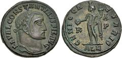 Roman Imperial Constantine I. As Filius Augustorum, AD 309-310. Æ Follis (22.5mm, 6.71 g, 12h). Alexandria mint, 1st officina. Laureate head right / Genius standing left, holding patera from which liq
