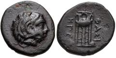 MACEDON, Philippoi (as Krenides). Circa 360-356 BC. Æ (11mm, 1.33 g, 11h). Head of Herakles right, wearing lion skin / Tripod. SNG ANS 670-1. VF, dark green patina, small obverse pits. Scarce. Krenide