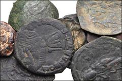 BYZANTINE. Lot of ten (10) Æ and PB issues from Justinian I to Michael II. Includes: Justinian I. PB Seal // Leo VI. Æ Follis // Michael II. Æ Trachy (3) // Anonymous. Æ Follis (3) // Unattributed. Æ 