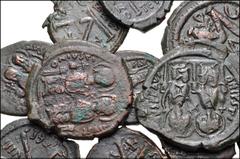 BYZANTINE. Lot of eleven (11) Æ Folles and Half Folles of Justin II, with Sophia. Includes: Æ Follis. Constantinople mint (3) // Æ Half Follis. Thessalonica mint (8). Good Fine to Near VF. LOT SOLD AS