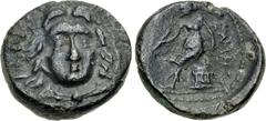 Greek LYCIA, Telmessos. Ptolemy II. Circa 196-189 BC. Æ (15.5mm, 3.52 g, 11h). Radiate head of Helios facing slightly right, drapery around neck / Apollo, testing arrow and placing hand on grounded bo