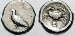 SICILY, Akragas Estimate $400 SICILY, Akragas. Circa 510-480 BC. AR Didrachm (8.56 gm). Eagle standing left / Crab; helmet right below. Jenkins, The Coinage of Gela, Group III, pl. 37, 14 (same dies);