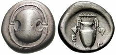 BOEOTIA, Thebes Estimate $250 BOEOTIA, Thebes. Circa 395/390-338 BC. AR Stater (11.57 gm). Boeotian shield / Amphora; E/V left, E right, ivy leaf hanging from each handle, club to the left above. Hepw