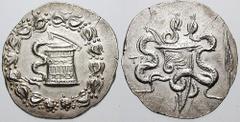 LYDIA, Tralles. Estimate $200 LYDIA, Tralles. Circa 160-155 BC. AR Cistophoric Tetradrachm (12.58 gm). Cista mystica with serpent; all within ivy wreath / Bow-case with serpents; spear point to the ri