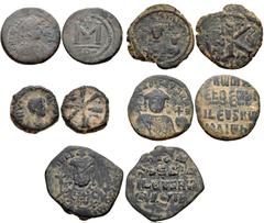 BYZANTINE. Lot five (5) bronze coins from Anastasius to Nicephorus II. Includes: Anastasius I. Æ Follis. Constantinople mint. Struck circa 498-507. DOC 16; SB 14 // Justinian I. Æ Pentanummium. Consta