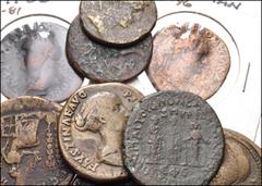 ROMAN. Imperial. Lot of sixteen (16) bronze coins from Vespasian to Otacilia Severa. Includes: Vespasian. Æ As // Titus. Æ As // Domitian. Æ As (3) // Nerva. Æ Dupondius // Trajan. Æ Dupondius // Faus