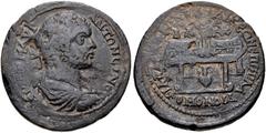 LYDIA, Philadelphia. Caracalla. AD 198-217. Æ (38mm, 30.85 g, 5h). Homonoia with Laodicea . Laureate, draped, and cuirassed bust right / Palm between two prize urns set on table; amphora under table. 
