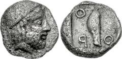 LOKRIS, Thronion. Circa 440-430 BC. AR Obol (9mm, 0.86 g, 5h). Diademed male head right / Knemis within shallow incuse square. BCD Lokris 161 (same dies). Near VF, toned, porous. Extremely rare, the t