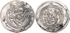 HUNNIC TRIBES, Hephthalites. Before AD 700. AR Drachm (31mm, 3.27 g, 4h). Imitating a Post-Yazdgerd year 37 dirhem from the AY mint. Crowned Sassanian style bust right; Sogdian tamgha and legend in ma