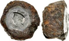 Counterfeiter’s die. Circa 82 BC. Iron die for AR Denarius. Dimensions: overall length, 20mm; diameter, 33 mm at face, tapering to approximately 27mm at base. Of cylindrical form. Weight: 94.05 grams.