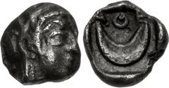 ATTICA, Athens. Circa 400/390-294 BC. AR Tetartemorion (5mm, 0.17 g, 6h). Helmeted head of Athena right / Upward-facing crescent within incuse square. Kroll –; SNG Copenhagen 78–9. VF, toned. Good met