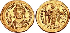 Justinian I. 527-565. AV Solidus (20mm, 4.43 g, 6h). Thessalonica mint. Struck 562. Helmeted and cuirassed facing bust, holding globus cruciger and shield / Angel standing facing, holding long cross a