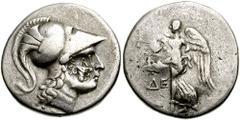 192080. Sold For $395 PAMPHYLIA, Side. Circa 200-190 BC. AR Tetradrachm (28mm, 16.62 gm). Head of Athena right, wearing crested Corinthian helmet; c/m: bow in bow-case with ΣAΡ around / Nike advancing