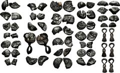 Hoard of 32 Cut Silver Coins, Hacksilber, and Jewelry. Late 5th century BC. . Composed of the following: (1) SICILY, Syracuse. Hieron I. 478-466 BC. Tetradrachm fragment (6.22 g). Struck circa 478-475