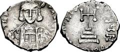 Leo III the "Isaurian". 717-741. AR Pattern solidus or ceremonial issue (19mm, 2.25 g, 6h). Constantinople mint, 8th officina. Struck 717-720. Helmeted and cuirassed bust facing, holding spear and shi