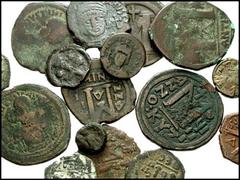 BYZANTINE. Lot of eleven Æ. Lot includes the following: Anastasius I. Æ Follis // Justinian I. Æ Follis (4) // Same. Æ Half Follis // Same. Æ Pentanummus (2) // Justin II Æ Follis // Same. Half Follis