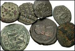 BYZANTINE. Lot of seven Æ, some with overstrikes. Lot includes the following: Justinian I. Æ Follis. SB 199 // Same. SB 216 // Constans II. Æ Follis. SB 1108. Double struck // Michael III. Æ Follis. S