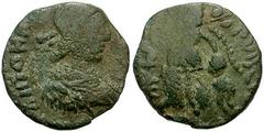 JOHANNES. 423-425 AD. Æ 12mm (0.95 gm). Rome mint. Pearl-diademed, draped, and cuirassed bust right / Victory advancing left, holding trophy over shoulder and dragging captive; christogram in left fie