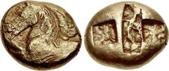 IONIA, Uncertain. Circa 550-525 BC. EL Stater (18mm, 14.25 g). Lydo-Milesian standard. Forepart of bridled horse left; rosette at breast, floral symbol (lotus?) at nape of the neck / Three incuses: a 