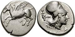 CORINTHIA, Corinth. Circa 405-345 BC. AR Stater (8.44 gm). Estimate $300 CORINTHIA, Corinth. Circa 405-345 BC. AR Stater (8.44 gm). Pegasos flying left / Helmeted head of Athena right; hand holding fl