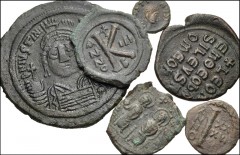 BYZANTINE. Lot of six (6) bronze coins from Justin I to Leo VI. Includes: Justin I. Æ Pentanummium // Justinian I. Æ Follis // Justninian I. Æ Decanummium // Justin II, and Sophia. Æ Half Follis // Le