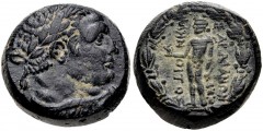 LYDIA, Sardes. Circa 133 BC-AD 14. Æ (15mm, 7.74 g, 12h). Menoitos, magistrate. Laureate bust of a Herakles right, with lion's skin tied around neck / Apollo standing left, holding crow an laurel bran