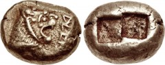 KINGS of LYDIA. Alyattes. Circa 610-560 BC. EL Trite (13mm, 4.69 g). Sardes mint. Head of roaring lion right, “sun” on forehead; [W]ALW[EL] (in Lydian, retrograde) downward on right / Two square punch