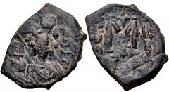 ISLAMIC, Umayyad Caliphate. Pseudo-Byzantine coinage. Circa 640s. Æ Fals (21mm, 3.81 g, 6h). Imitating a follis of Constans II. Crowned imperial-style bust facing, holding globus cruciger / Large M; “