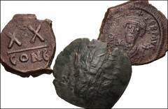 BYZANTINE. Lot of three (3) bronze coins. Includes: Phocas. Æ Half Follis (2) // Unidentified Æ Trachy. Average Fine, roughness and scratches on the half folles, the trachy smoothed. LOT SOLD AS IS, N