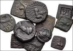 ORIENTAL GREEK–CENTRAL ASIAN. Lot of eleven (11) bronze coins. Various rulers and types. Mix of Indo-Greek (Baktrian), Indo-Skythian, and Kushan. Diameters from 11 to 20mm. Fine to VF, cleaning marks 