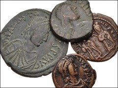 BYZANTINE. Lot of four (4) bronze coins of Anastasius to Phocas. Includes: Anastasius. Æ Follis (2) // Justinian I. Æ Half Follis // Phocas. Æ Follis. VF. LOT SOLD AS IS, NO RETURNS. Four (4) coins in